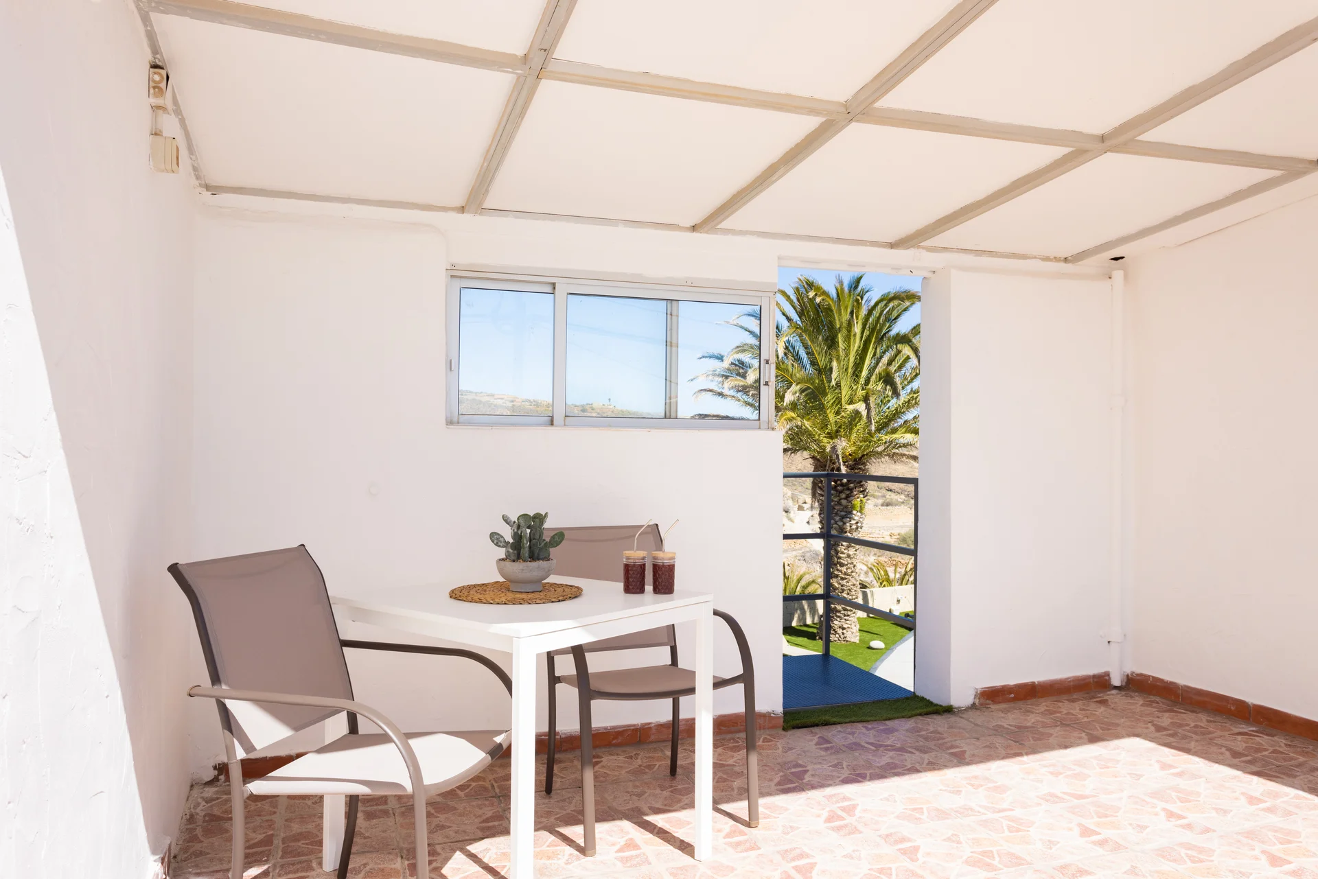 Terrace with armchair and table